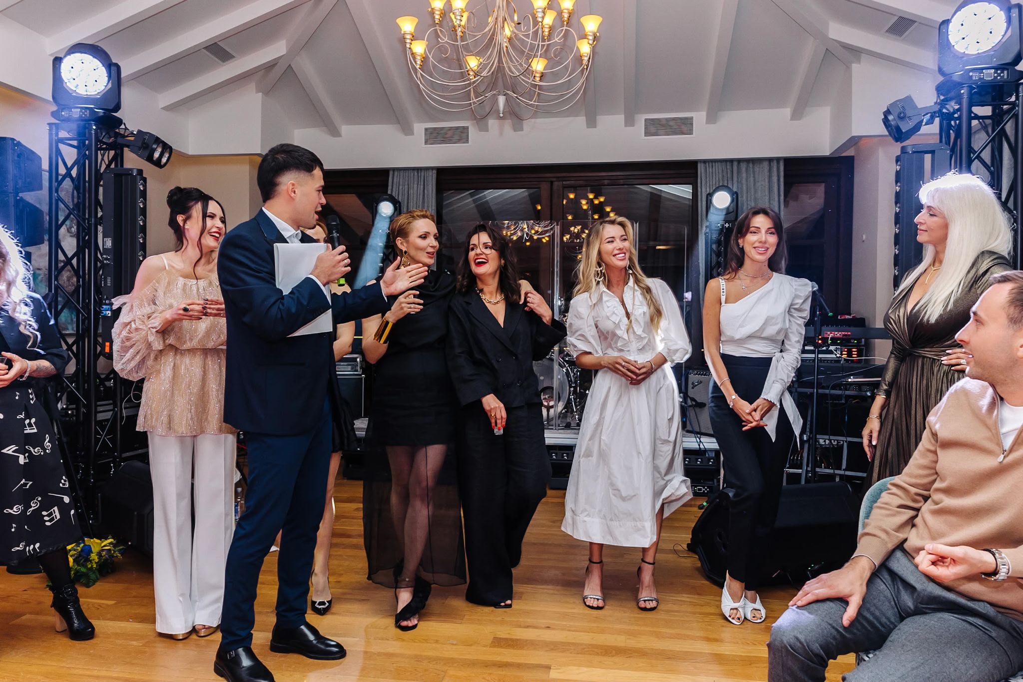 Vova leading a group game during the 60th birthday celebration