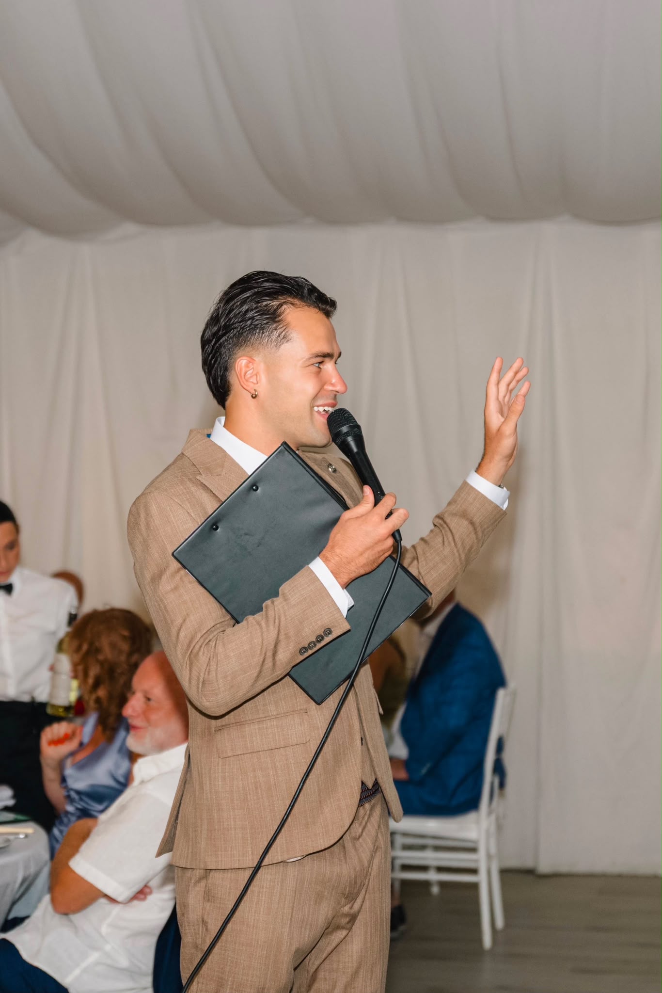 Vova speaking during Roman and Anna’s wedding reception